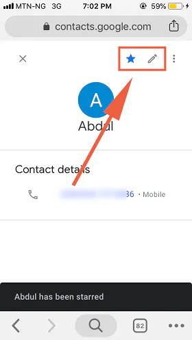 Google Contacts contact page on mobile with an arrow pointing to the star and edit icons