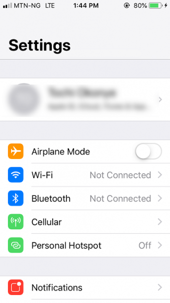 iPhone Settings screen with the Apple ID at the top