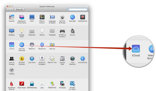 Mac System Preferences with the iCloud icon highlighted and magnified