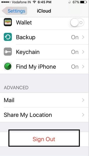 iPhone iCloud settings with Sign Out highlighted at the bottom