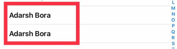 iPhone contact list with two duplicate entries for the same contact highlighted