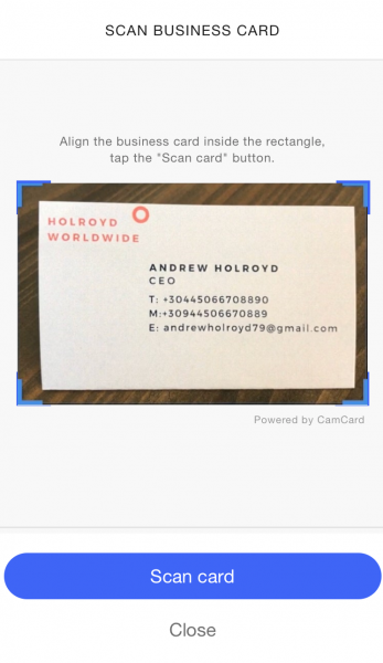 Covve Scan Business Card screen with a business card aligned inside the frame