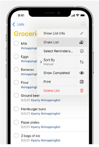 iPhone Reminders list with the More menu open and Share List highlighted